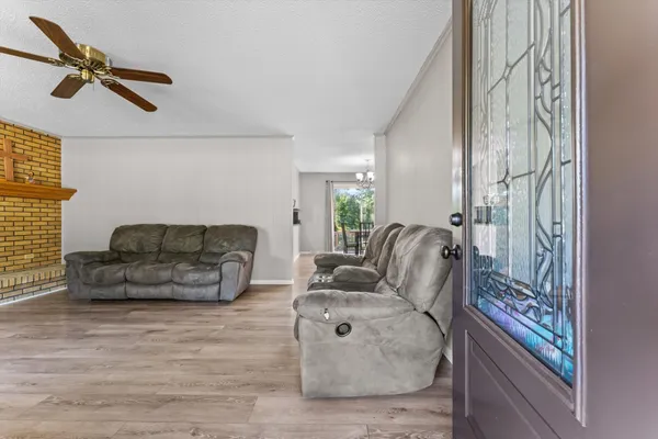 a living room with furniture and a rug
