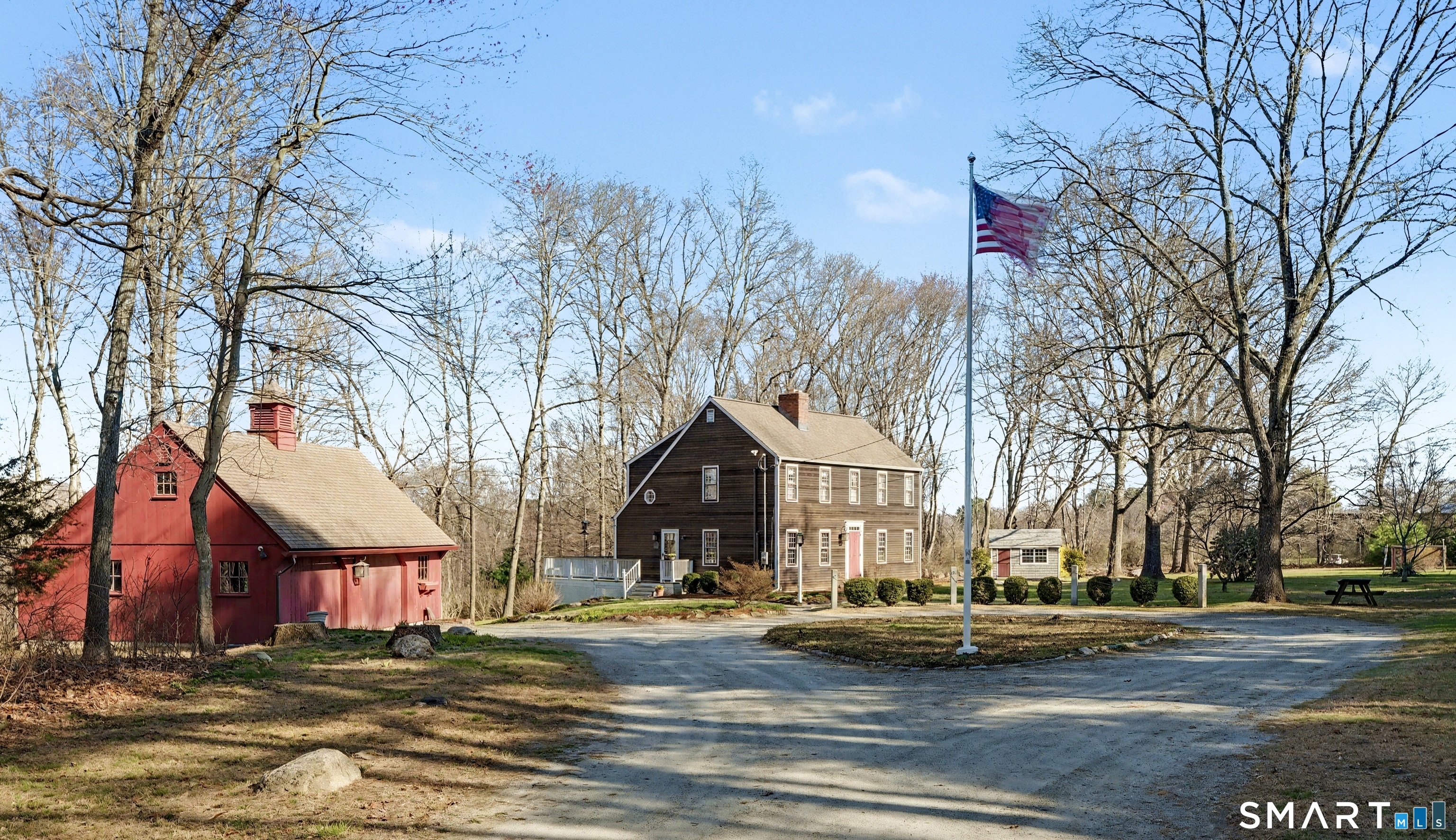 a view of a town with large trees