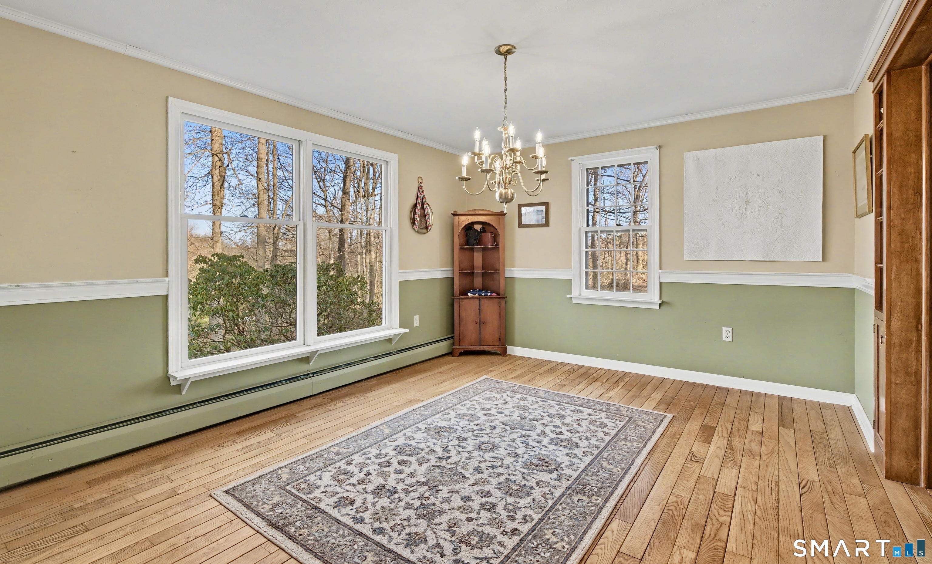 226 Middlesex Avenue Chester, CT 06412 - Photo 12 of 40 a view of a room with window wooden floor and windows