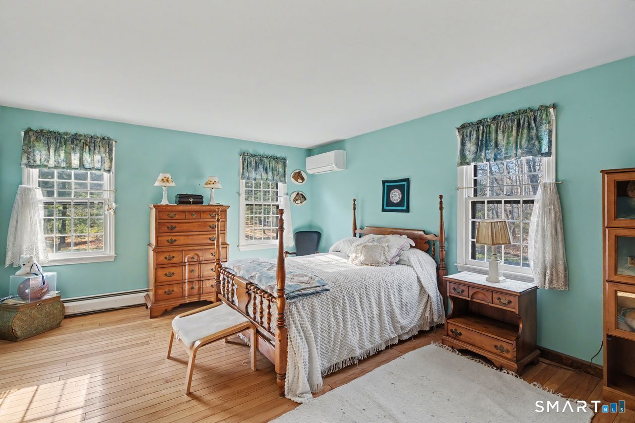 226 Middlesex Avenue Chester, CT 06412 - Photo 23 of 40 a bedroom with a bed and a window