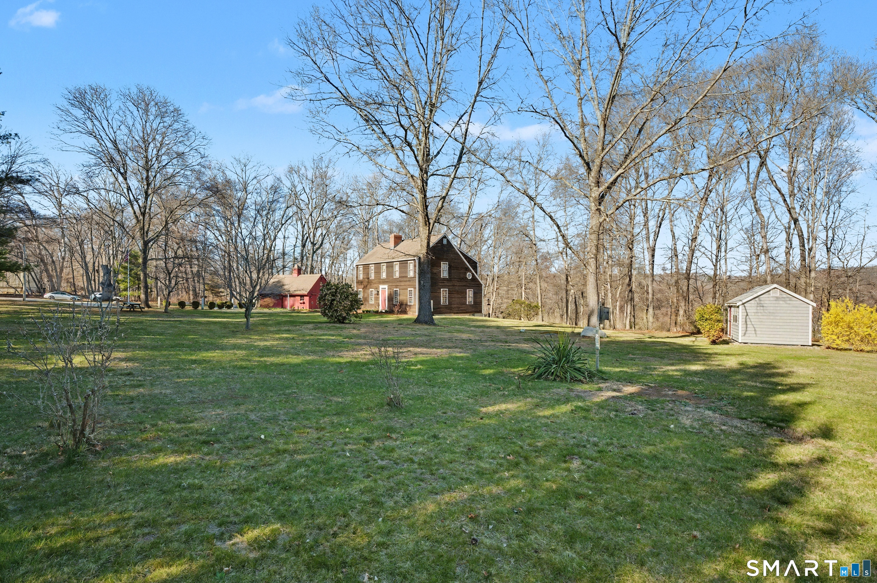 226 Middlesex Avenue Chester, CT 06412 - Photo 36 of 40 a view of a backyard with large trees