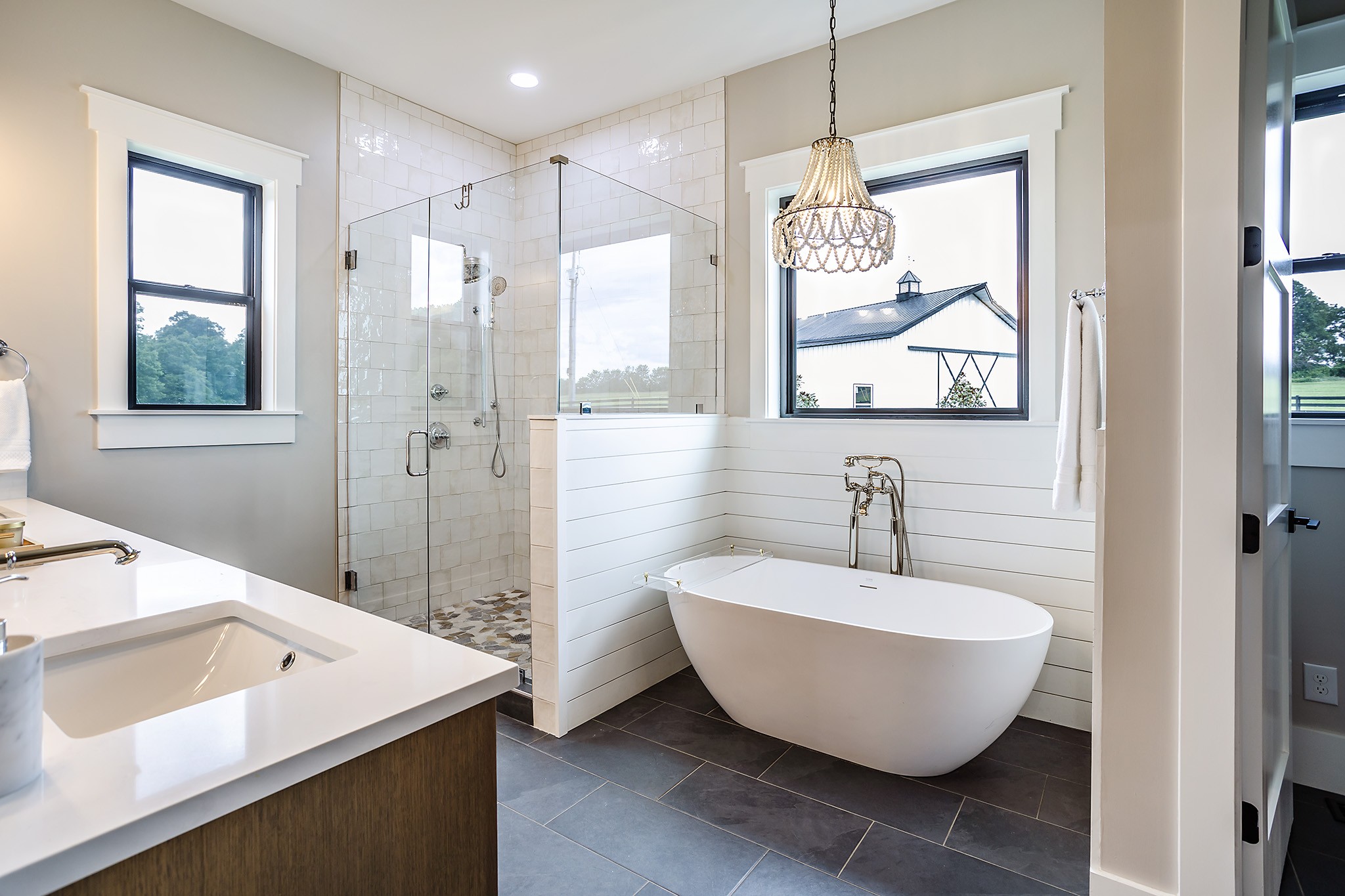 1143 Maxwell Branch Road Cottontown, TN 37048 - Photo 28 of 64 a spacious bathroom with a sink and a mirror