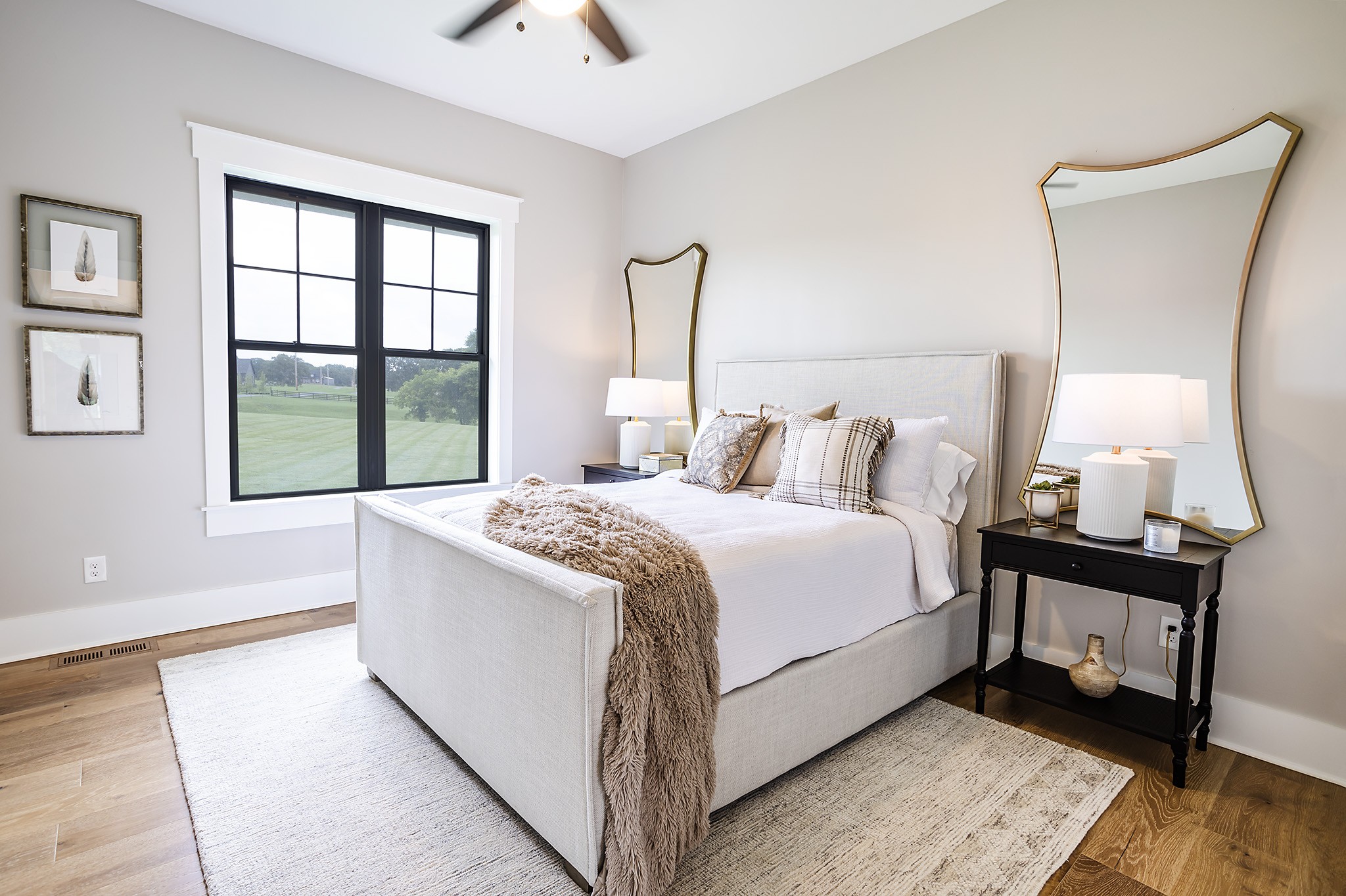 1143 Maxwell Branch Road Cottontown, TN 37048 - Photo 42 of 64 a spacious bedroom with a bed and a window