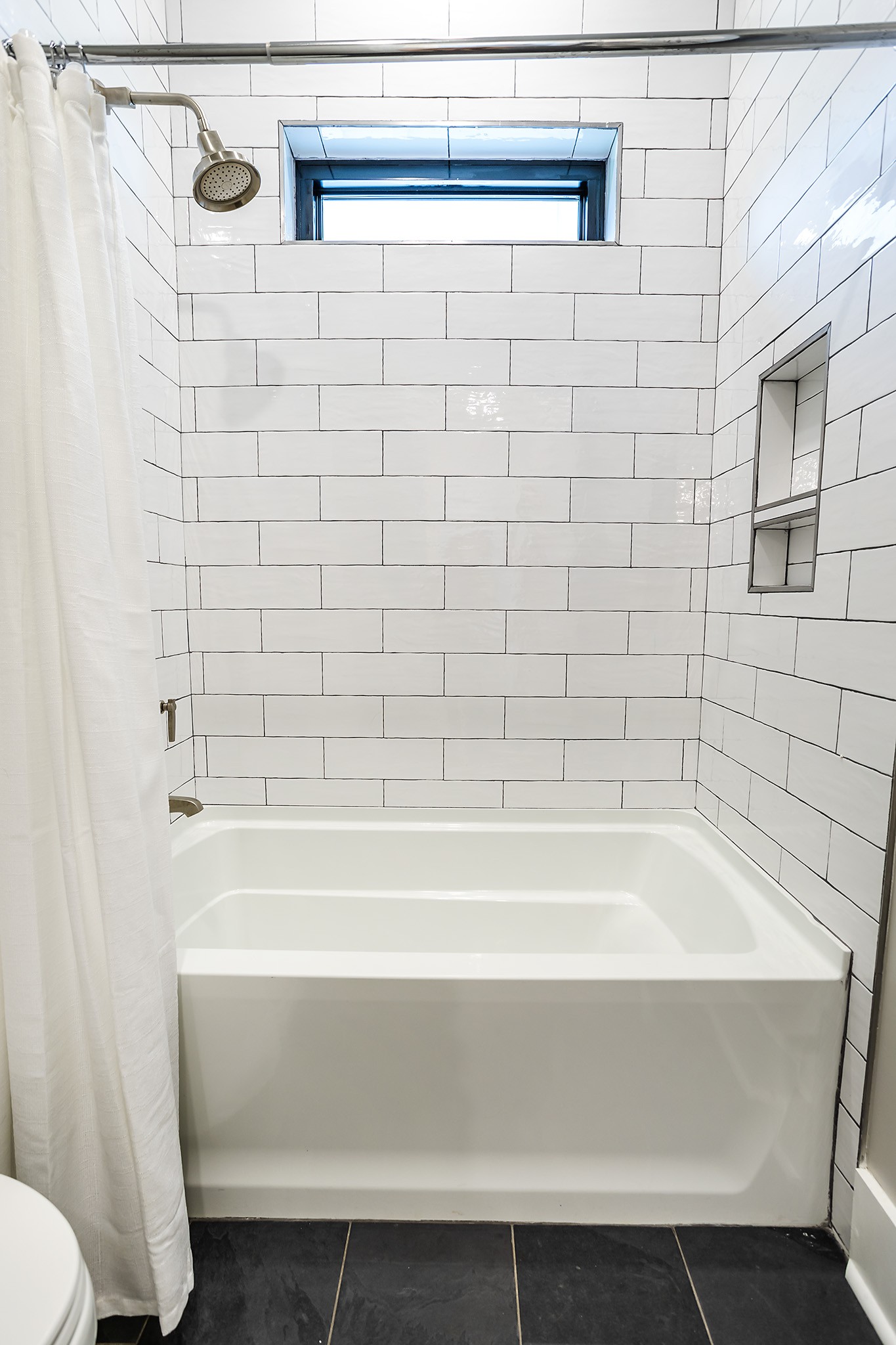 1143 Maxwell Branch Road Cottontown, TN 37048 - Photo 46 of 64 a bathroom with a bathtub and a toilet