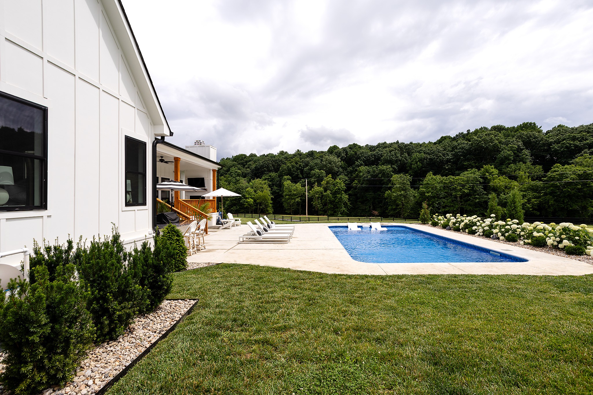 1143 Maxwell Branch Road Cottontown, TN 37048 - Photo 53 of 64 a view of a swimming pool with a yard