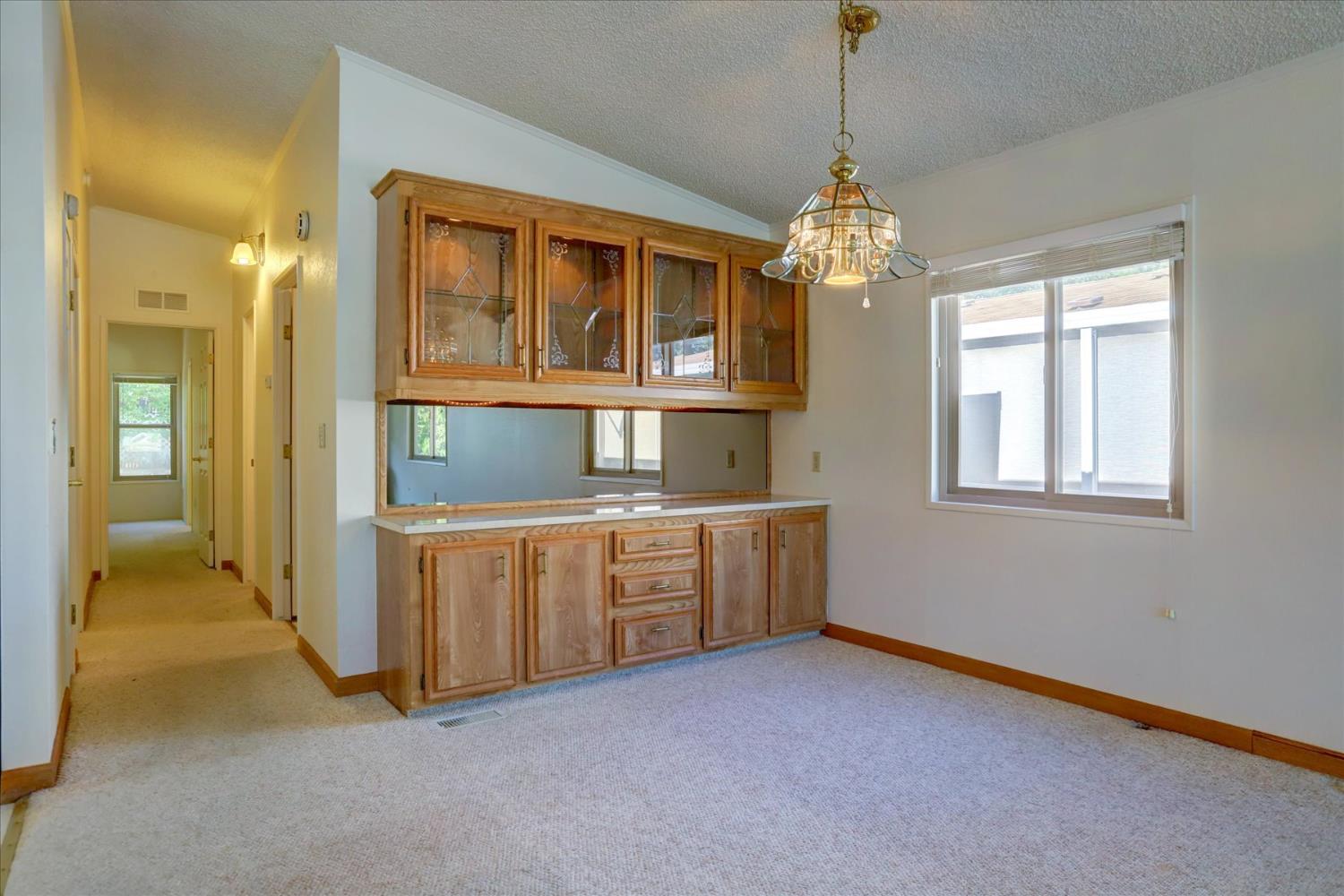 10046 Dalewood Way Grass Valley, CA 95949 - Photo 11 of 68 a living room with windows