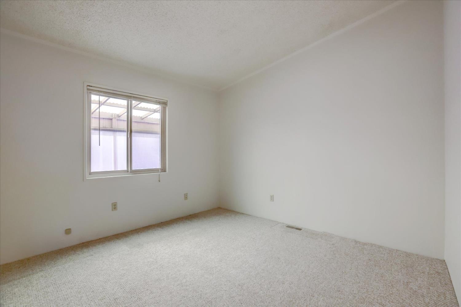 10046 Dalewood Way Grass Valley, CA 95949 - Photo 24 of 68 an empty room with a window