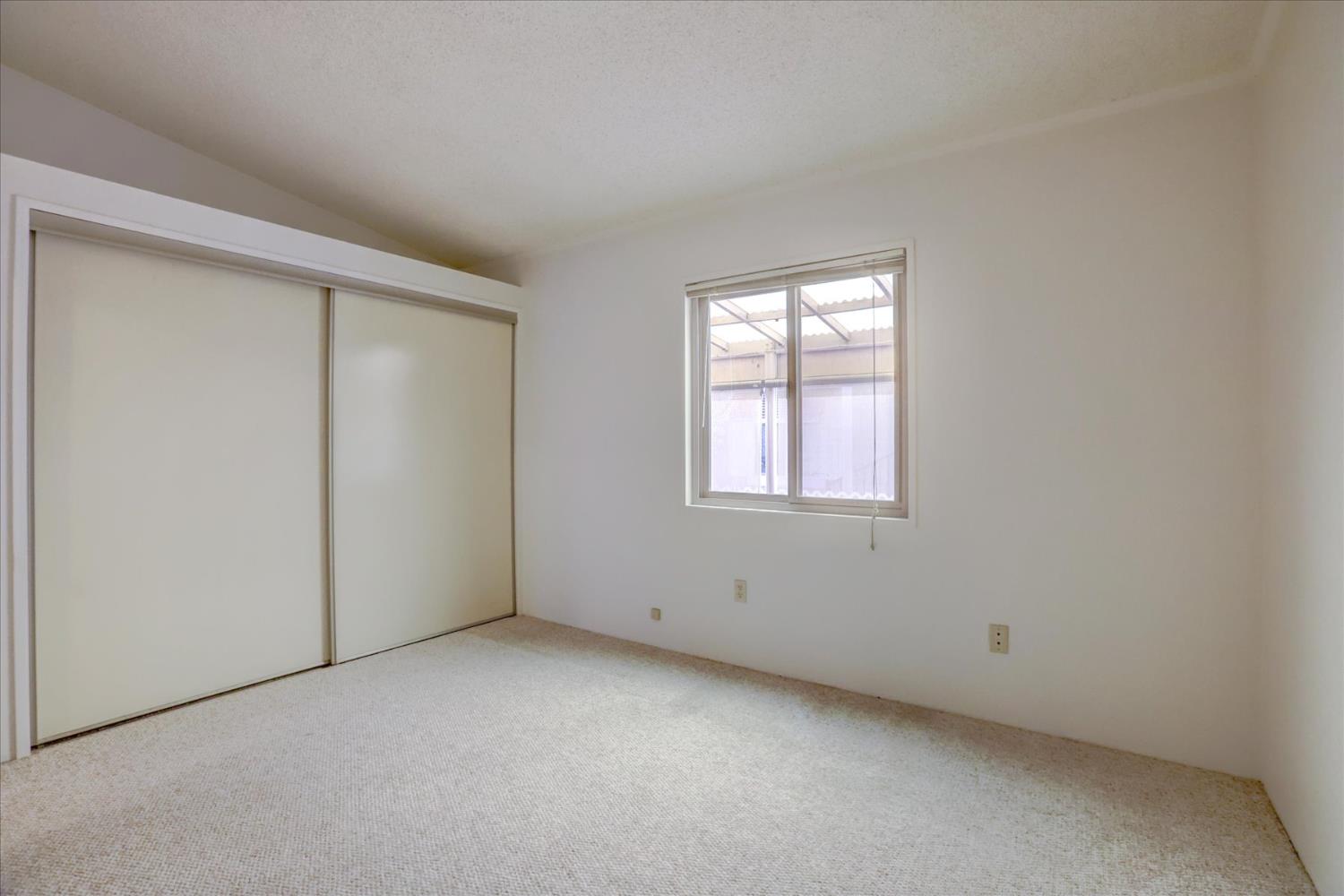 10046 Dalewood Way Grass Valley, CA 95949 - Photo 26 of 68 an empty room with windows