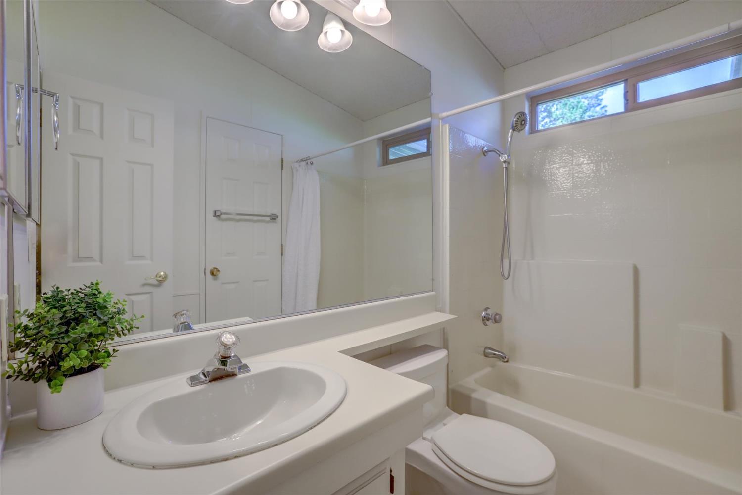 10046 Dalewood Way Grass Valley, CA 95949 - Photo 29 of 68 a bathroom with a sink toilet and shower