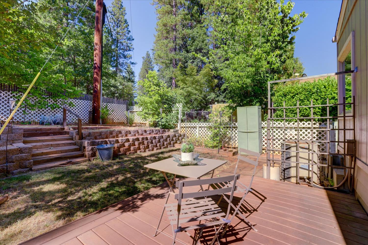 10046 Dalewood Way Grass Valley, CA 95949 - Photo 43 of 68 a view of a table and chairs in patio