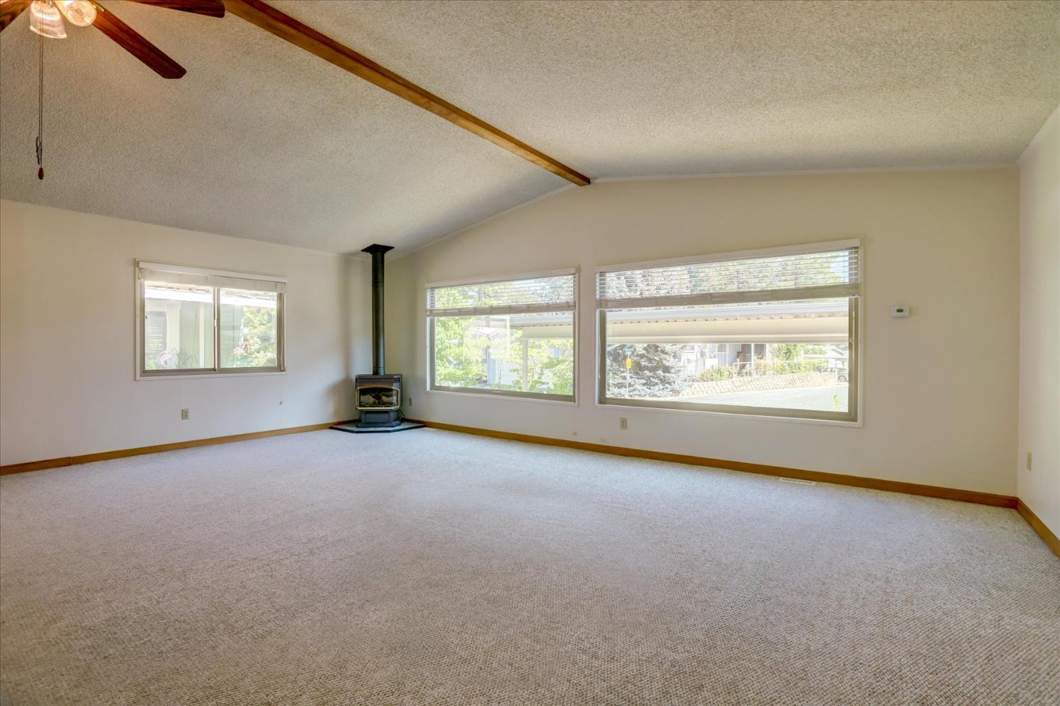 10046 Dalewood Way Grass Valley, CA 95949 - Photo 8 of 68 an empty room with windows