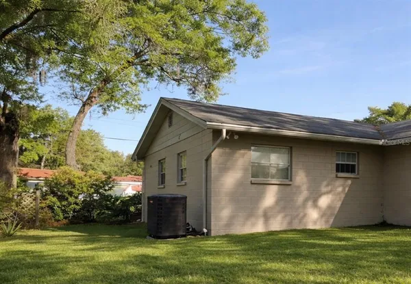 a front view of house with garden