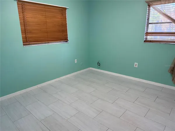 a view of a room that has a window