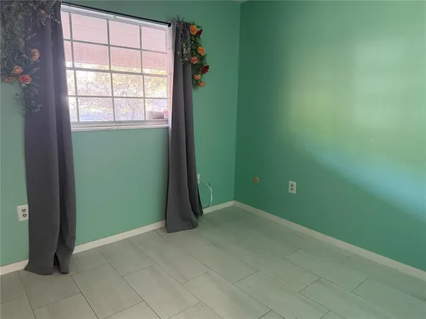 a view of an empty room with window