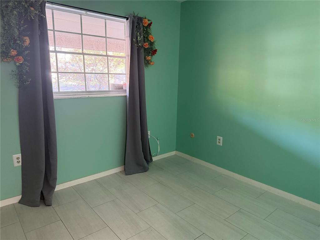 2320 Palm Avenue Seffner, FL 33584 - Photo 5 of 15 a view of an empty room with window