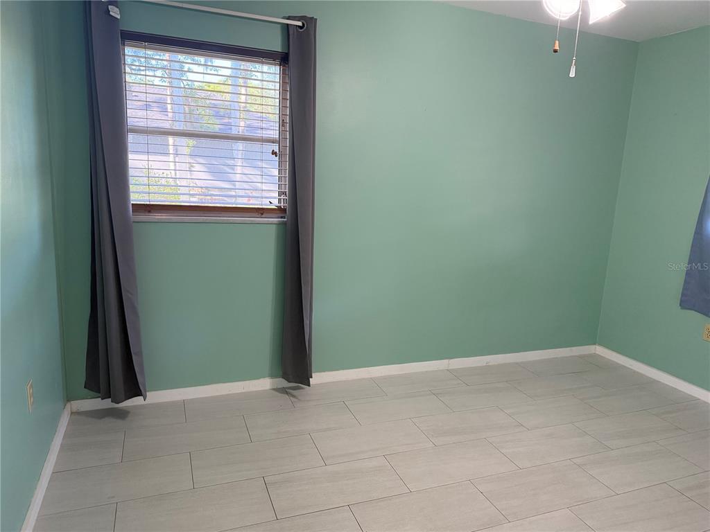 2320 Palm Avenue Seffner, FL 33584 - Photo 6 of 15 an empty room with a window