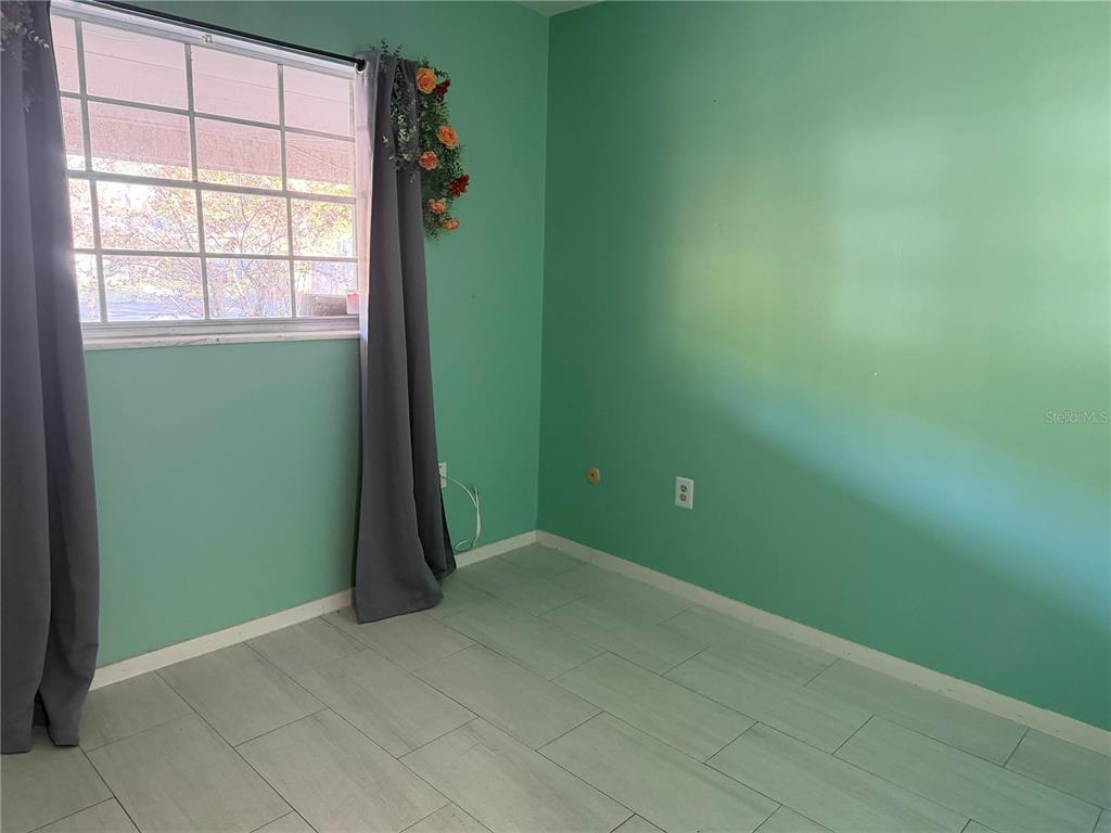 2320 Palm Avenue Seffner, FL 33584 - Photo 7 of 15 an empty room with windows