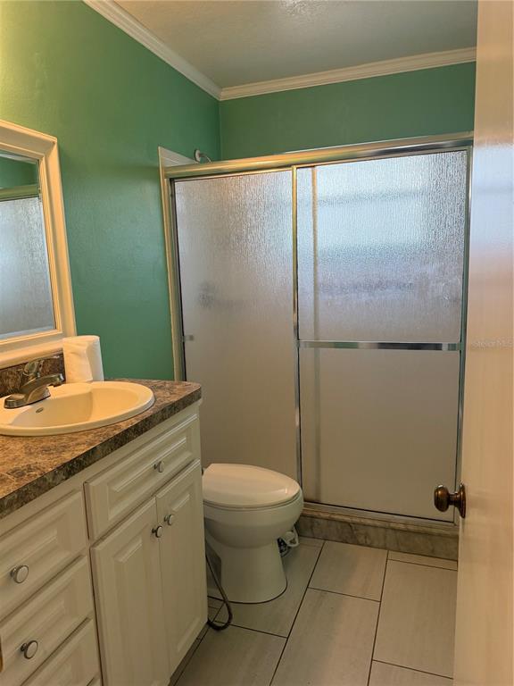 2320 Palm Avenue Seffner, FL 33584 - Photo 8 of 15 a bathroom with a granite countertop sink toilet and shower