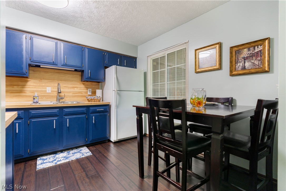 6674 Hills And Dales Road Northwest Canton, OH 44708 - Photo 13 of 34 Eat in kitchen with engineered hardwood floors.