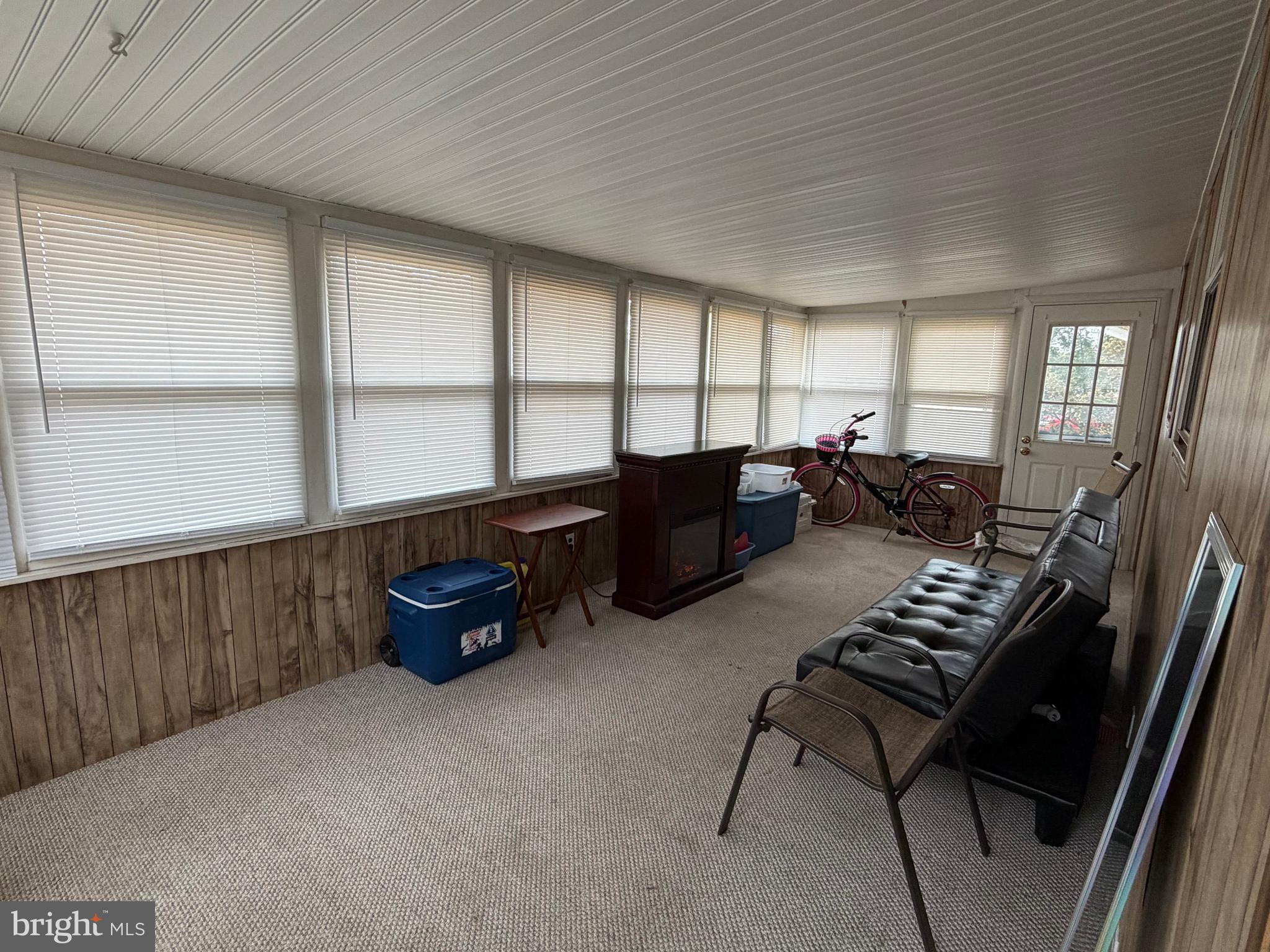 221 West 3rd Street Palmyra, NJ 08065 - Photo 9 of 20 a living room with furniture and a floor to ceiling window