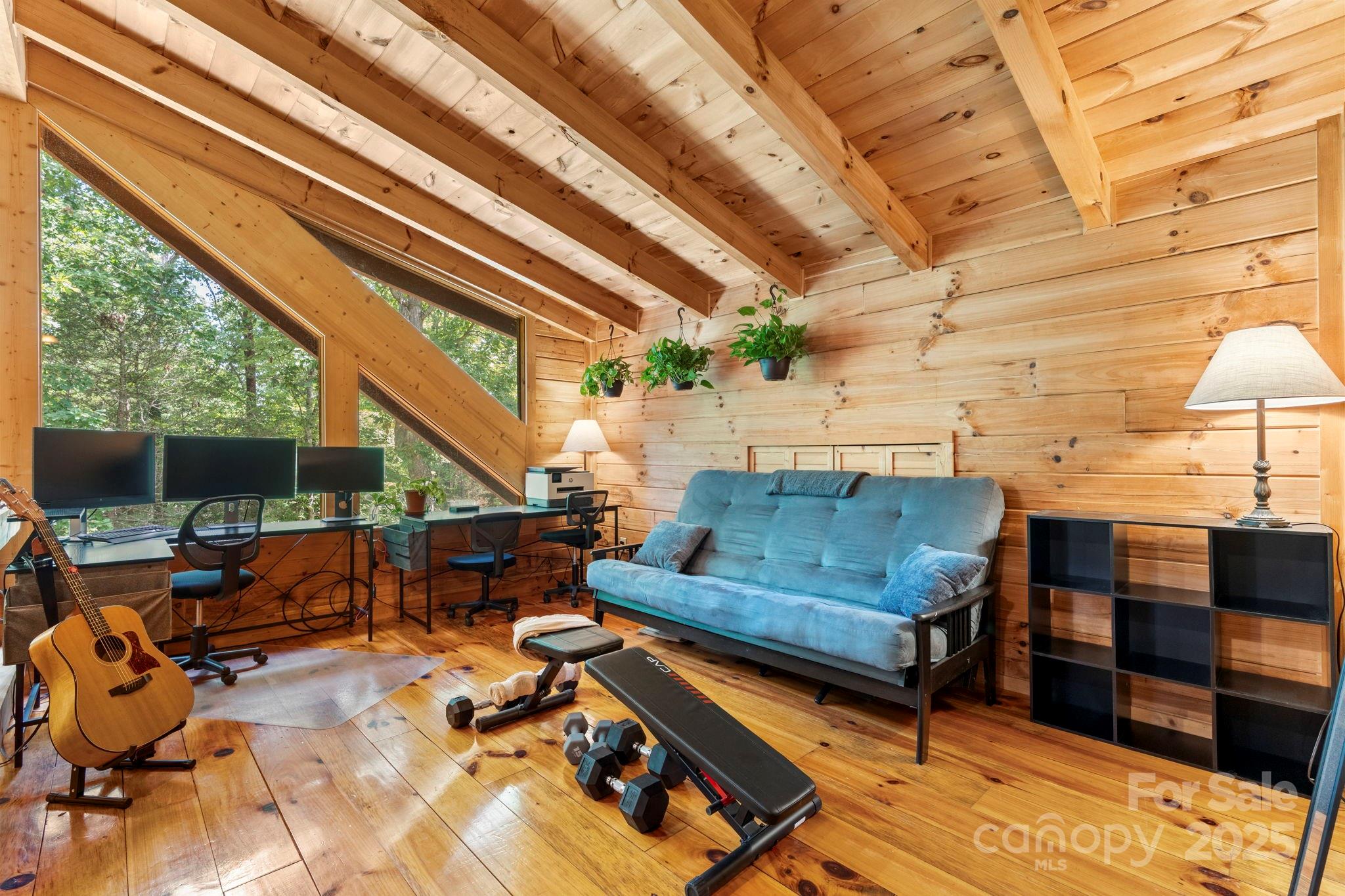 211 Granite Ridge Nebo, NC 28761 - Photo 14 of 43 a outdoor living space with patio furniture and a fireplace