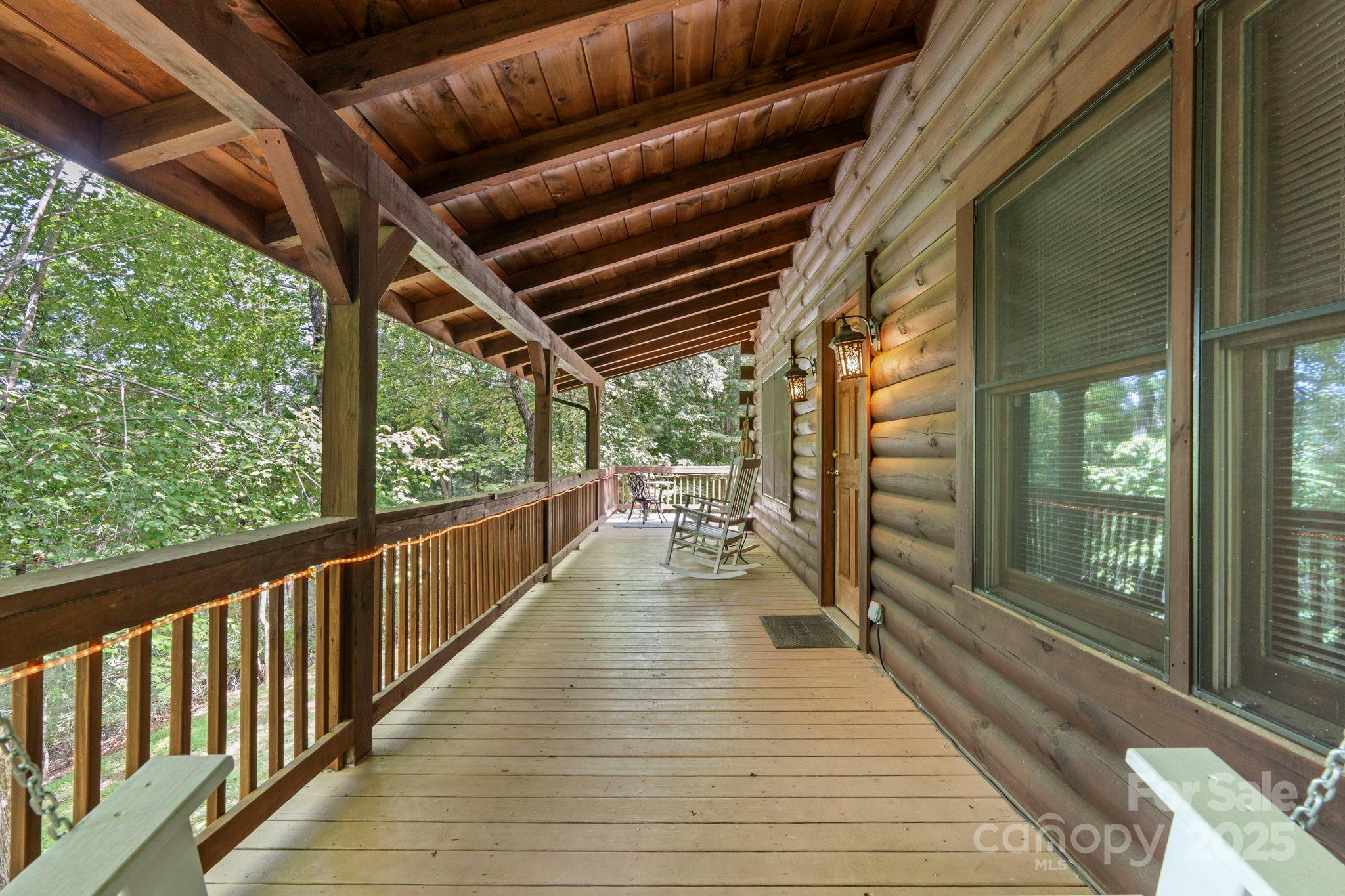211 Granite Ridge Nebo, NC 28761 - Photo 21 of 43 a view of a balcony with wooden floor