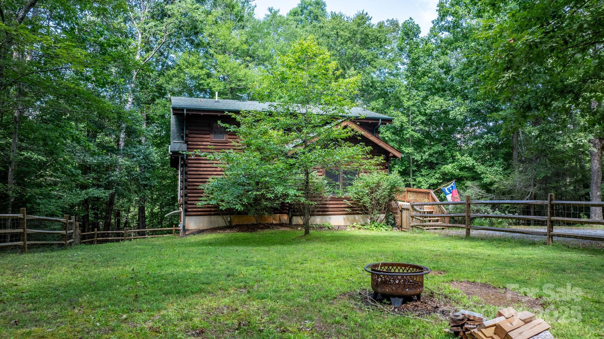211 Granite Ridge Nebo, NC 28761 - Photo 34 of 43 a view of backyard with a table and a chair