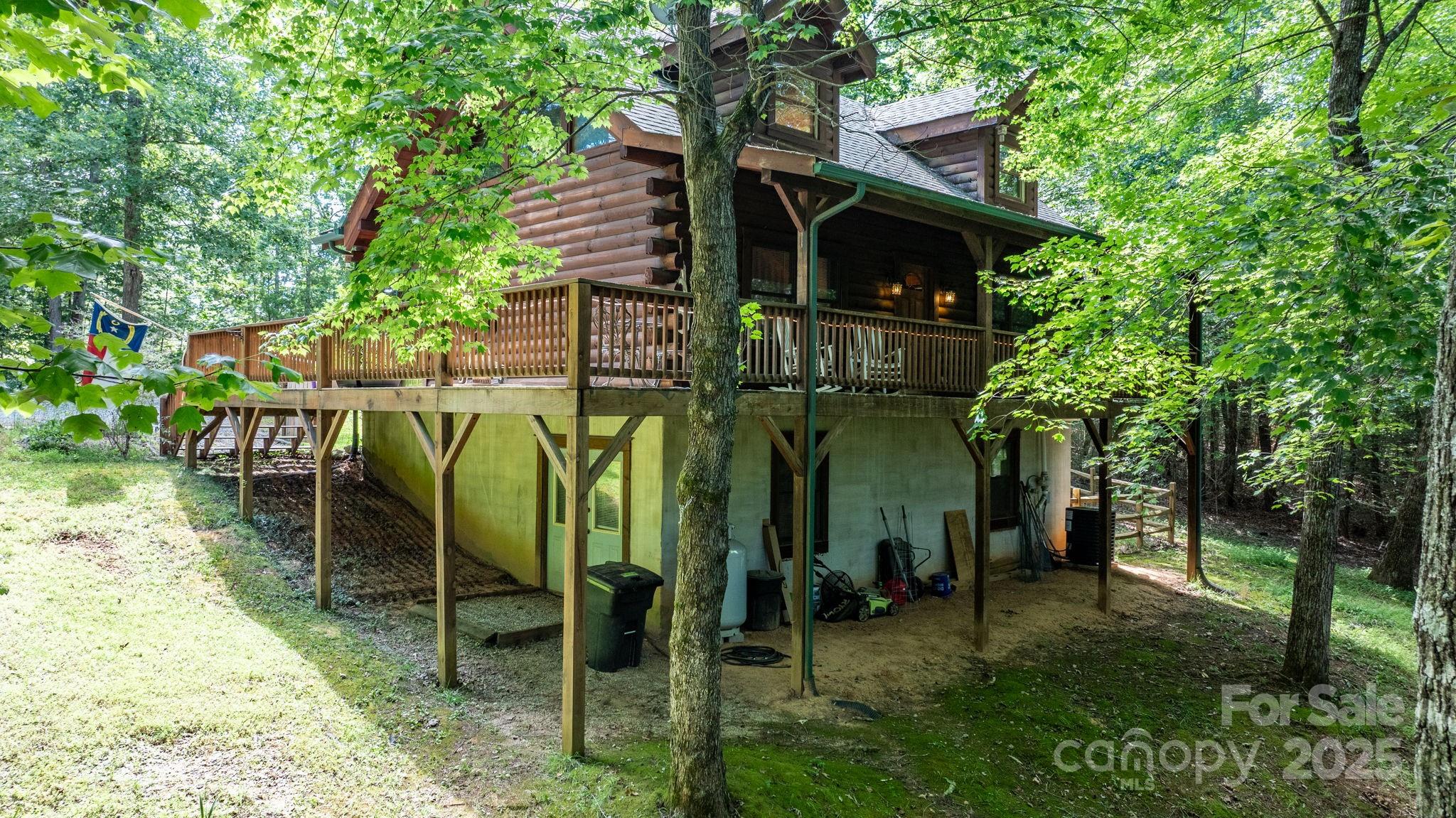211 Granite Ridge Nebo, NC 28761 - Photo 37 of 43 a view of an chairs and table in the patio