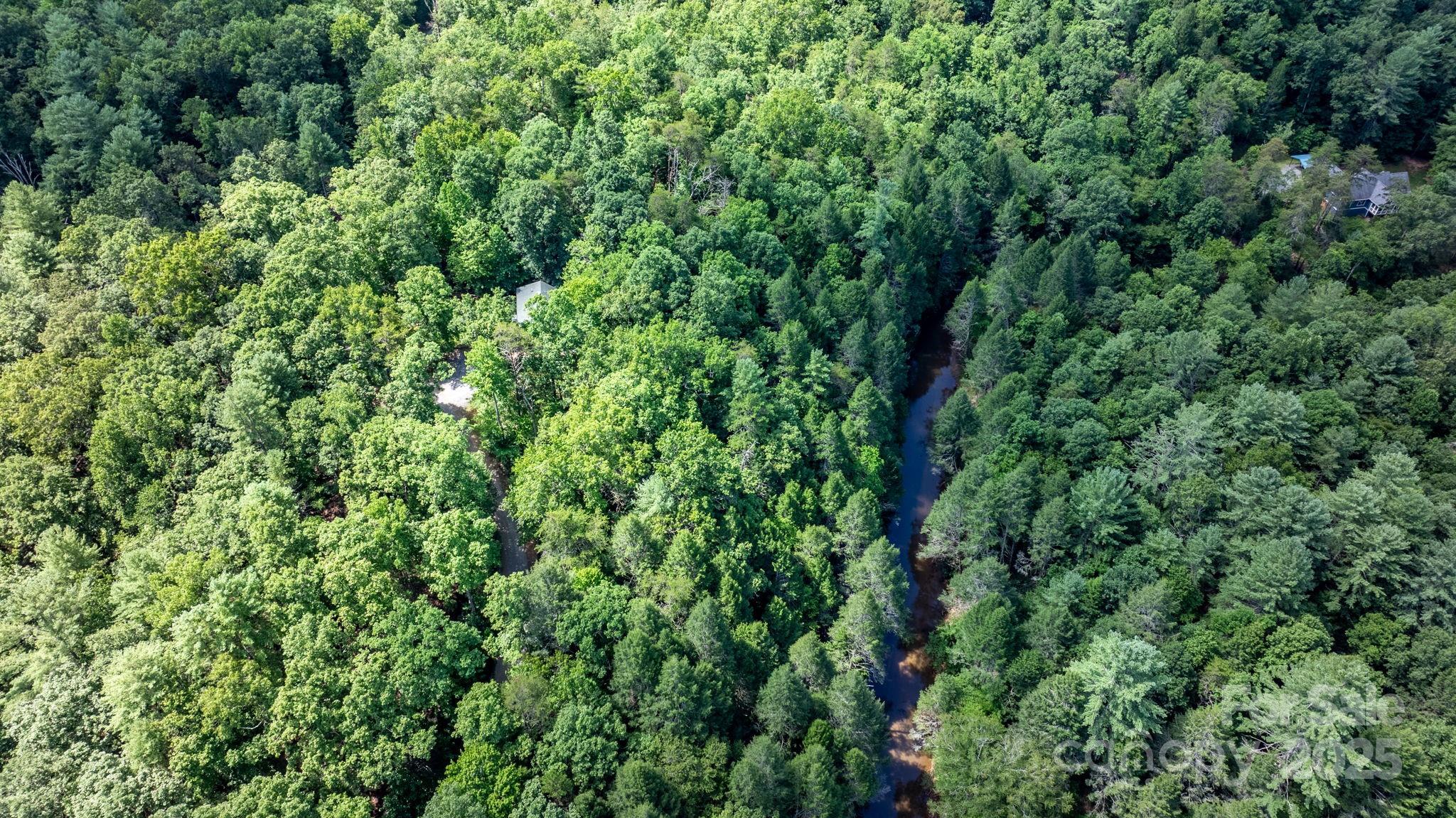 211 Granite Ridge Nebo, NC 28761 - Photo 39 of 43 an aerial view of residential house with outdoor space and trees all around