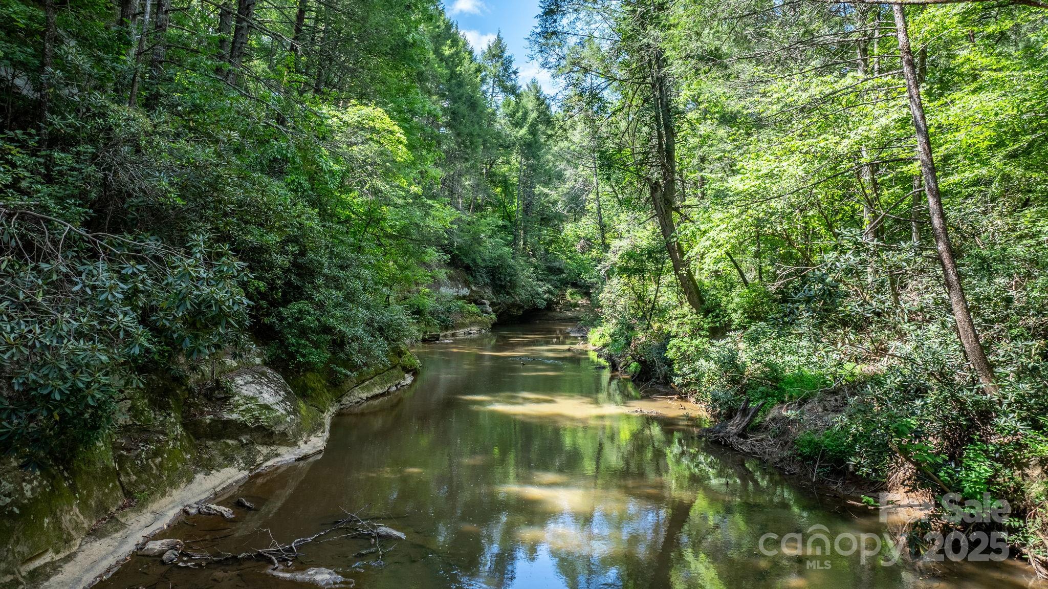 211 Granite Ridge Nebo, NC 28761 - Photo 6 of 43 a view of lake with green space