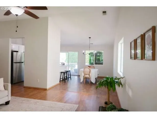 a living room with furniture and a area