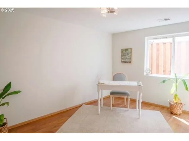 a bathroom with a sink a toilet and shower curtain