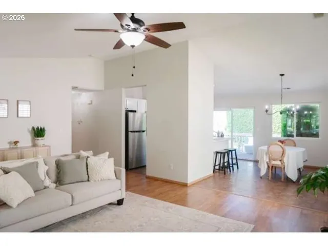 a view of a room that has a large window