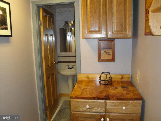 12327 Panama Road Reston, VA 20191 - Photo 12 of 29 half bath near garage entrance