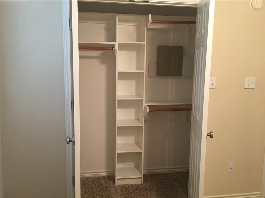 2218 Old Ironsides Road Abilene, TX 79601 - Photo 15 of 26 a view of a room with rack on the wall