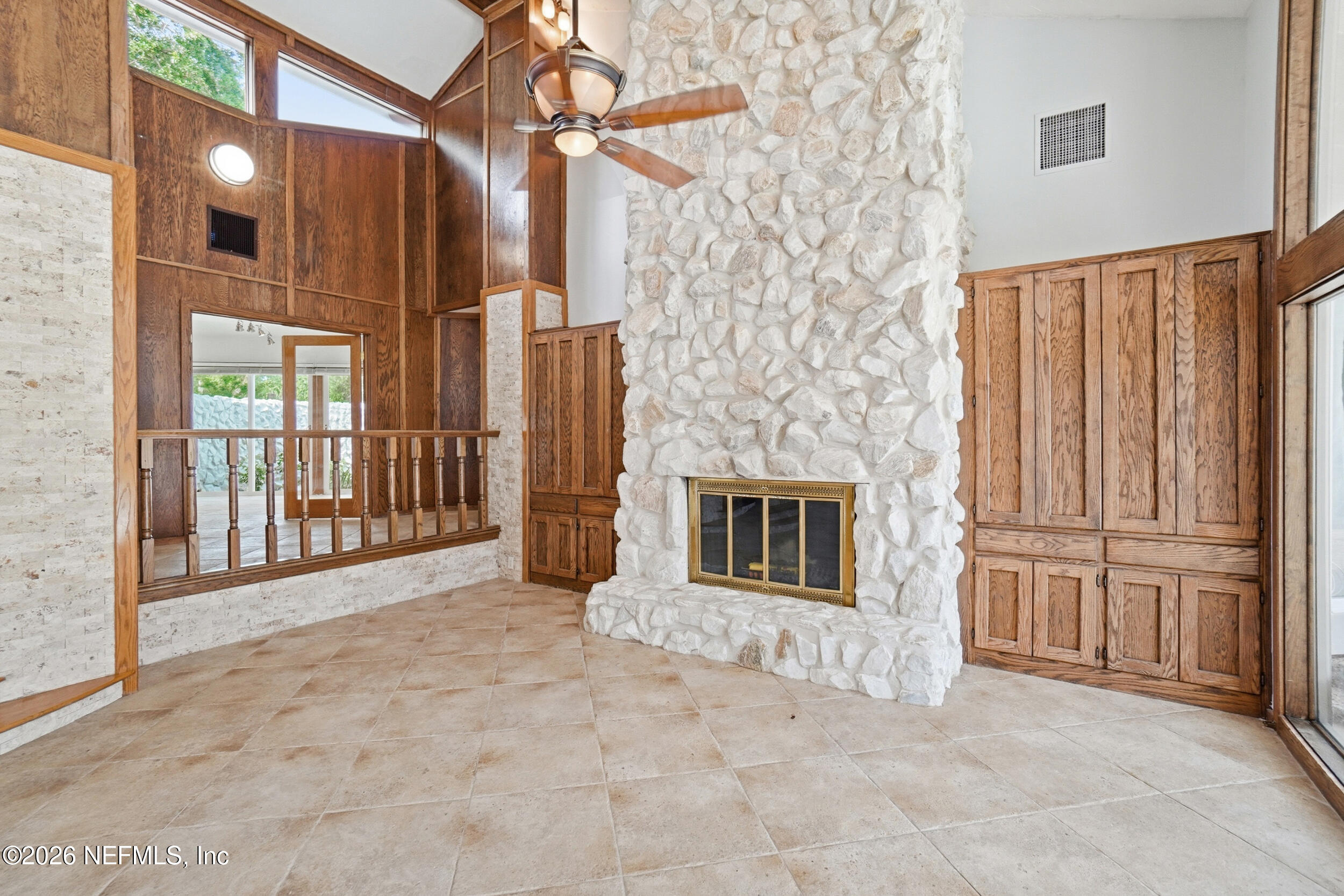 7911 Hunters Grove Road Jacksonville, FL 32256 - Photo 12 of 64 Left side with Fireplace/bookcases