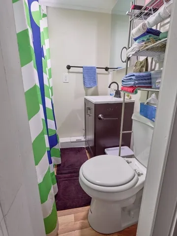 a bathroom with a toilet and a sink