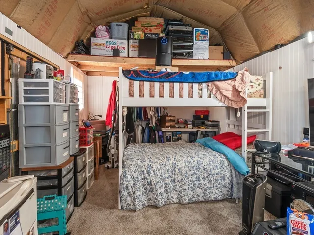 a view of a chairs and table in a patio