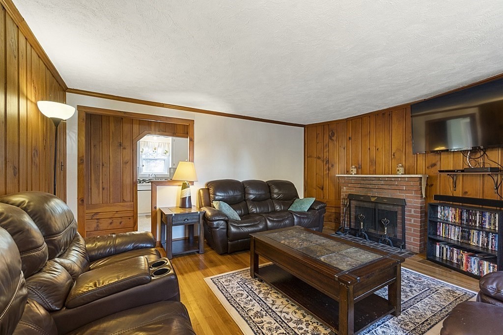 86 East Road Westminster, MA 01473 - Photo 18 of 29 a living room with furniture and a fireplace