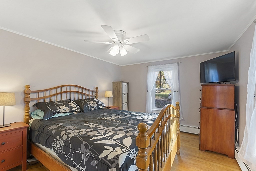 86 East Road Westminster, MA 01473 - Photo 19 of 29 a bed sitting in a bedroom next to a window