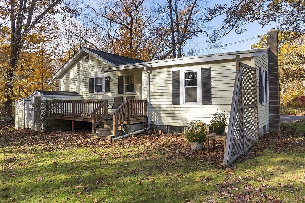 86 East Road Westminster, MA 01473 - Photo 28 of 29 a view of house with a yard and large tree in it