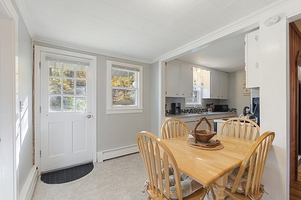 86 East Road Westminster, MA 01473 - Photo 6 of 29 a view of a dining room with furniture and a window