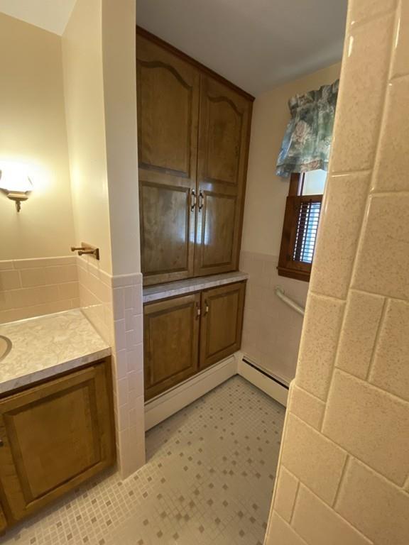 26 Charlton Road Dudley, MA 01571 - Photo 13 of 30 a kitchen with granite countertop a refrigerator and a stove