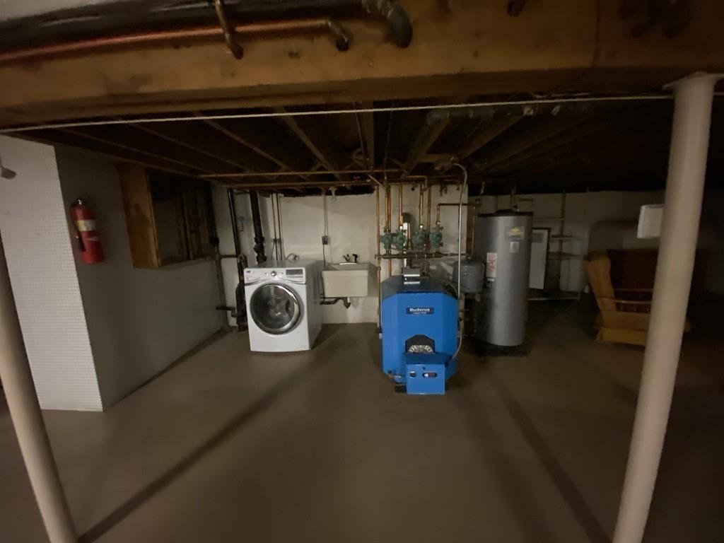 26 Charlton Road Dudley, MA 01571 - Photo 21 of 30 a view of storage and utility room