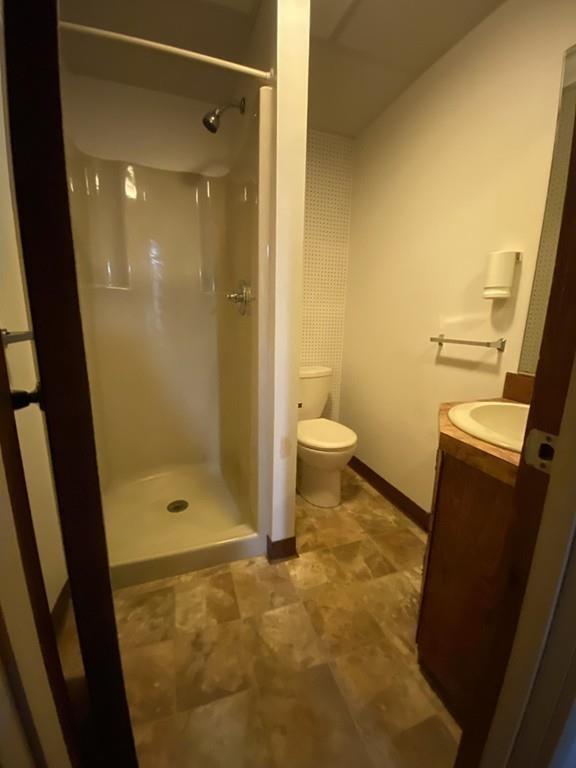 26 Charlton Road Dudley, MA 01571 - Photo 22 of 30 a bathroom with a shower and a toilet