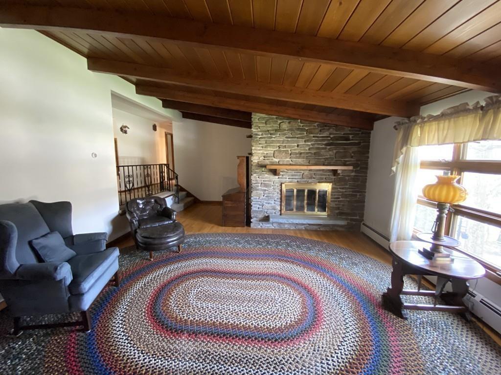 26 Charlton Road Dudley, MA 01571 - Photo 6 of 30 a living room with furniture rug and window