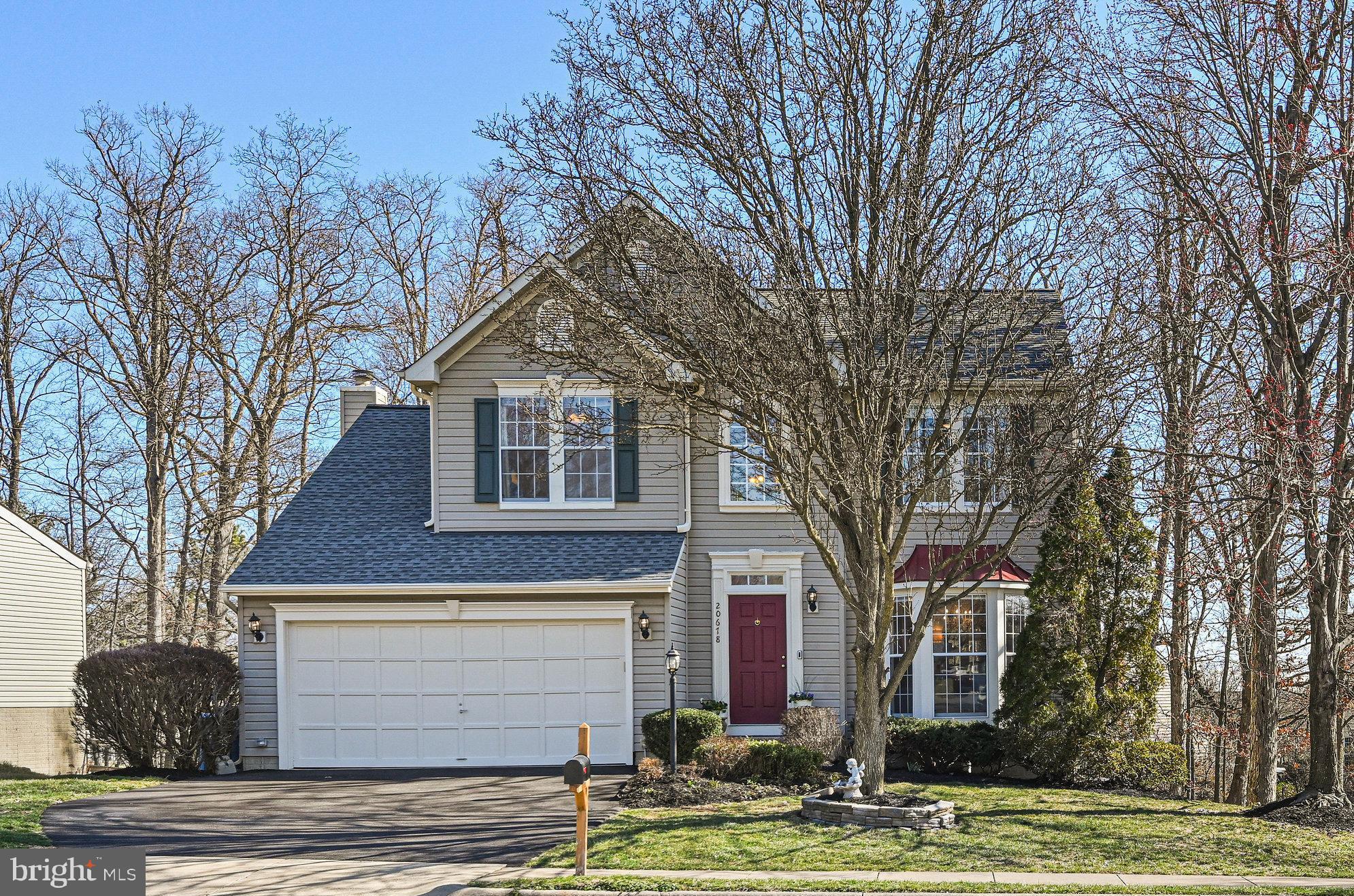 20678 Citation Drive Ashburn, VA 20147 - Photo 22 of 22 a front view of a house with garden