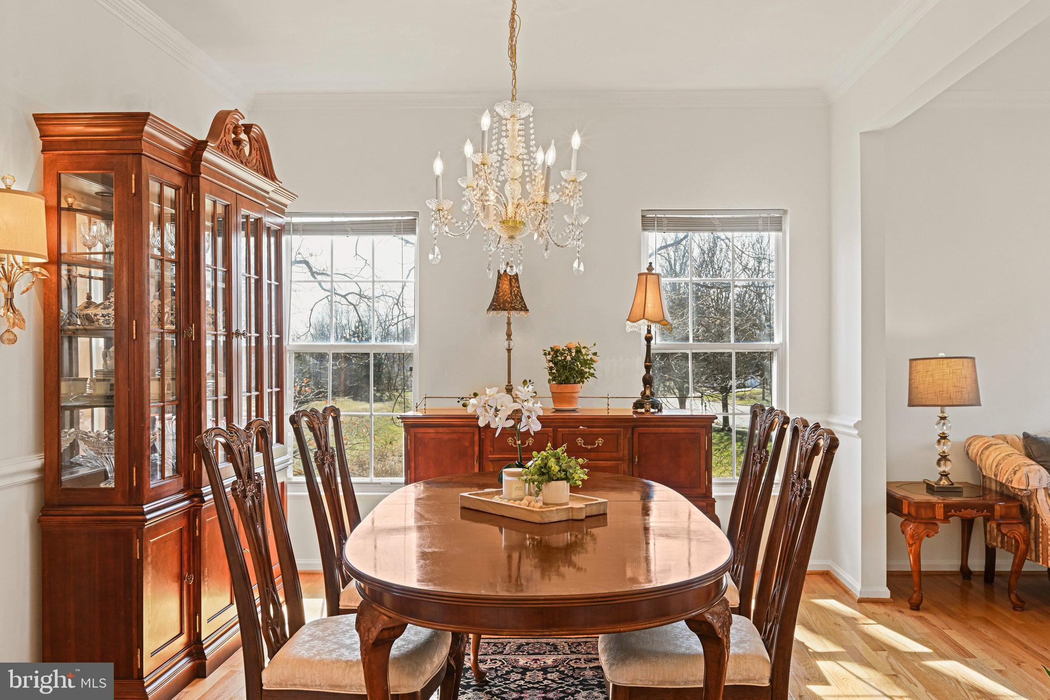 20678 Citation Drive Ashburn, VA 20147 - Photo 7 of 22 a view of a dining room with furniture window and outside view