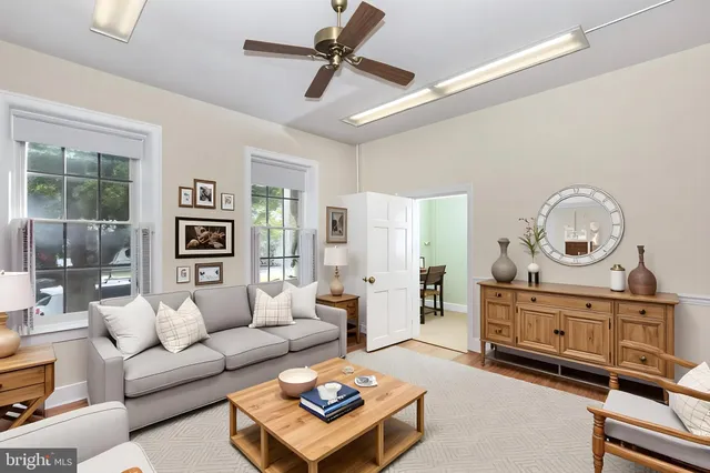 a kitchen with a stove a sink and a cabinets
