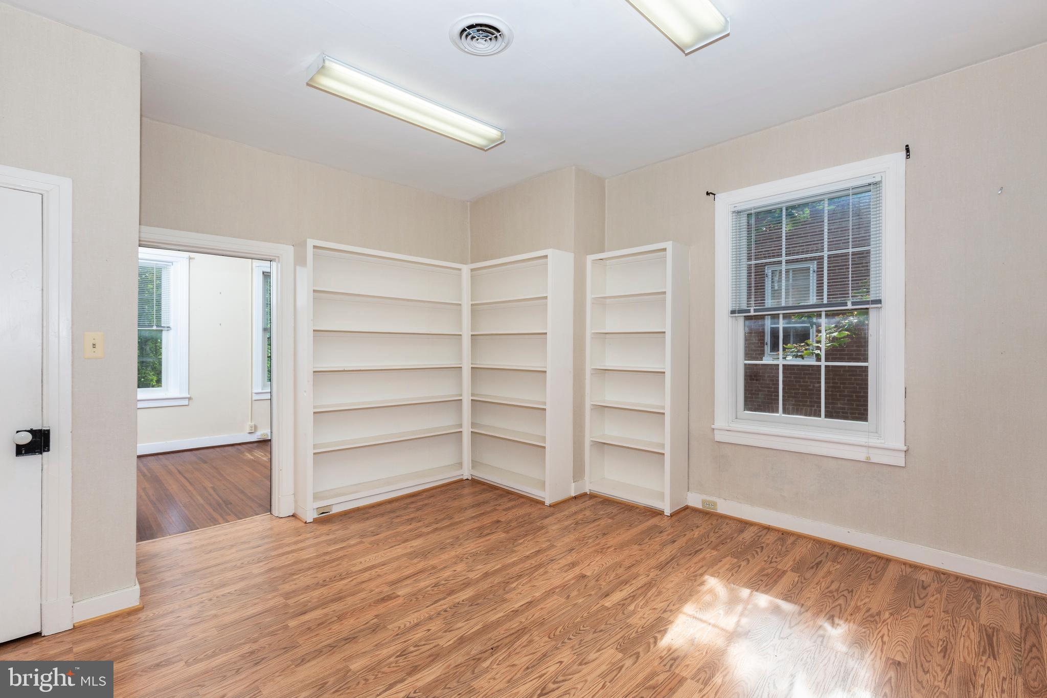 162 East Main Street Westminster, MD 21157 - Photo 30 of 50 Hardwood floors and built-in bookcases